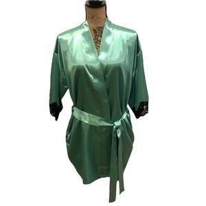 Fredrick’s of Hollywood satin robe with lace trim. Size XS